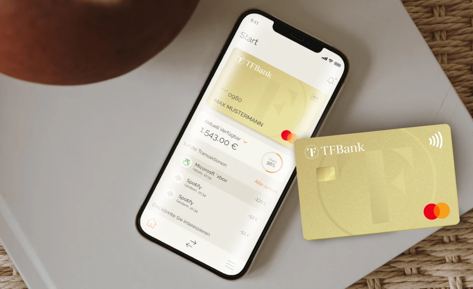 TF Mastercard Gold vor einem Smartphone